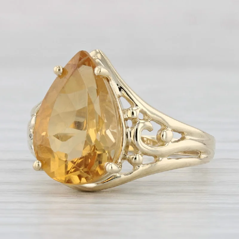 vintage-inspired halo engagement rings for women-5.80ct Orange Pear Citrine Solitaire Ring 14k Yellow Gold Size 8