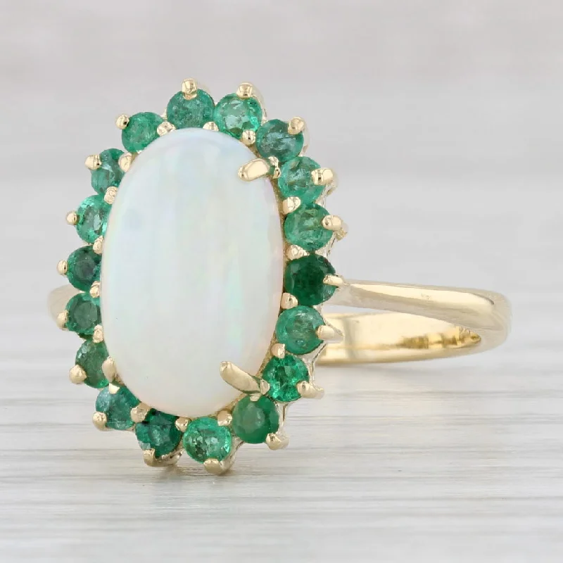 custom-designed engagement rings for women-Oval Cabochon Opal 0.90ctw Emerald Halo Ring 14k Yellow Gold Size 10