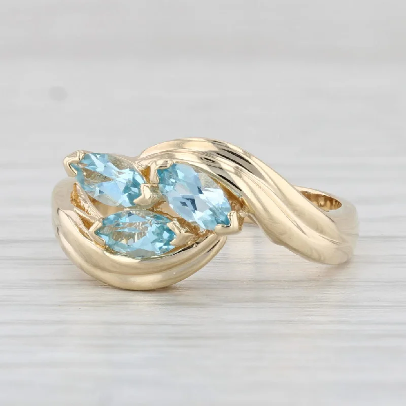 round diamond engagement rings for women-Blue Topaz 3-Stone Cluster Ring 14k Yellow Gold Size 6.5 Bypass