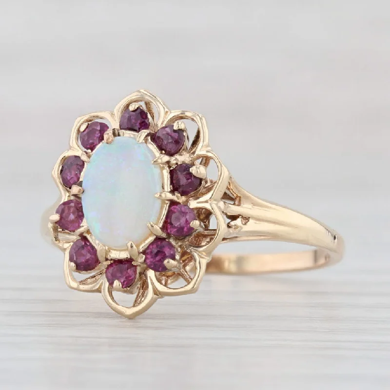 simple yet elegant engagement rings for women-Opal Ruby Halo Flower Ring 14k Yellow Gold Size 10.5 Oval Cabochon