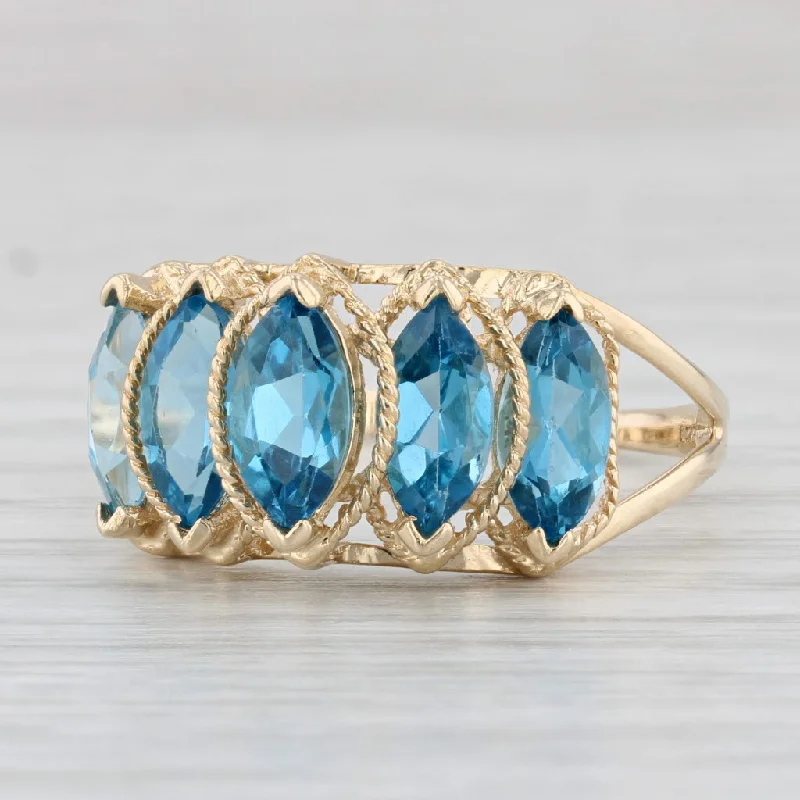 classic solitaire engagement rings for women-3.90ctw Tiered Marquise Blue Topaz Ring 14k Yellow Gold Size 10.5