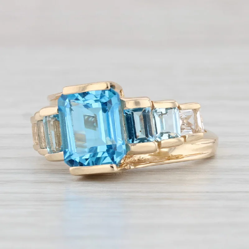 modern engagement ring styles for women-4.30ctw Blue White Tiered Topaz Ring 14k Yellow Gold Size 7